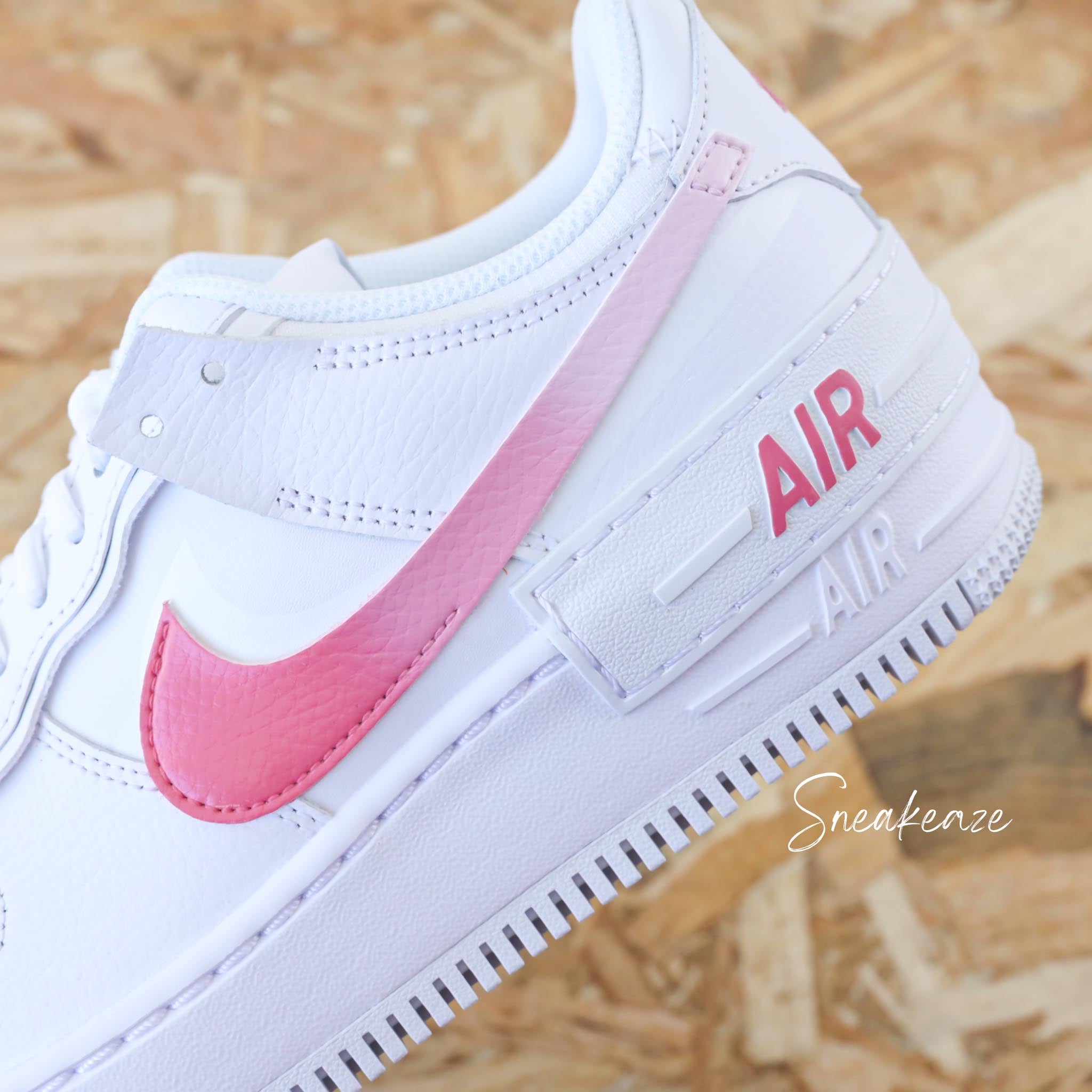 Nike air force pink swoosh on sale